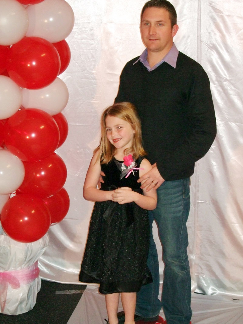 photo of a dad and daughter